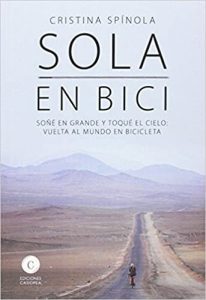 Sola en bici